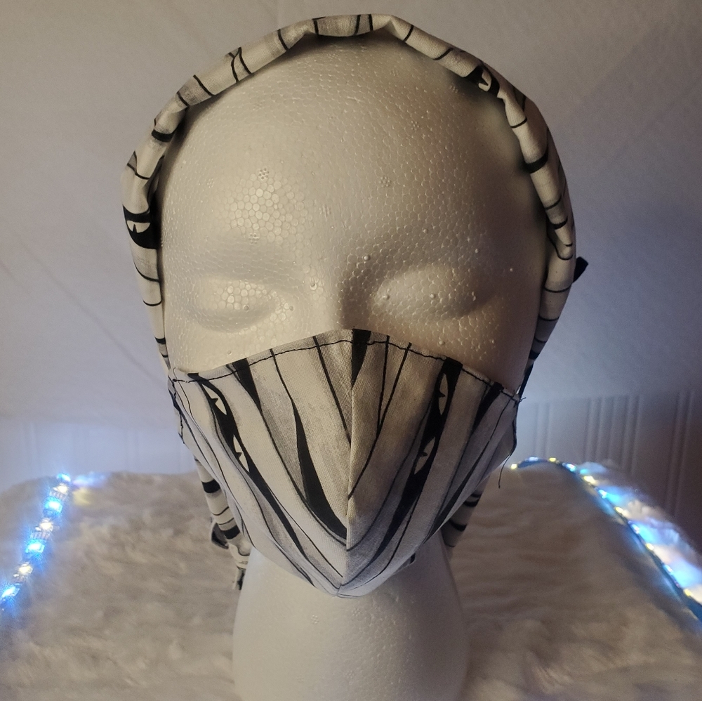 Halloween Adult homemade face mask and medical cap.